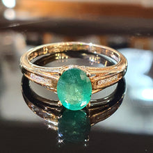 Emerald and Diamond ring set on 9ct Yellow Gold