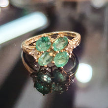 Emerald and Diamond ring set on 9ct Yellow Gold