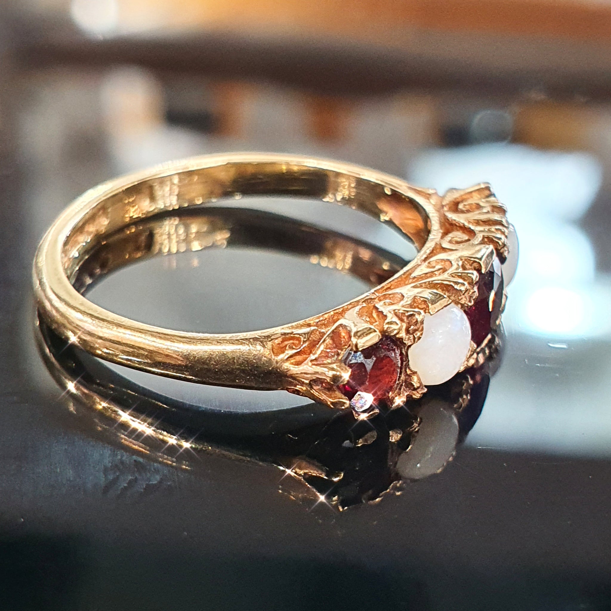 Opal and Garnet Ring set on 9ct Yellow Gold