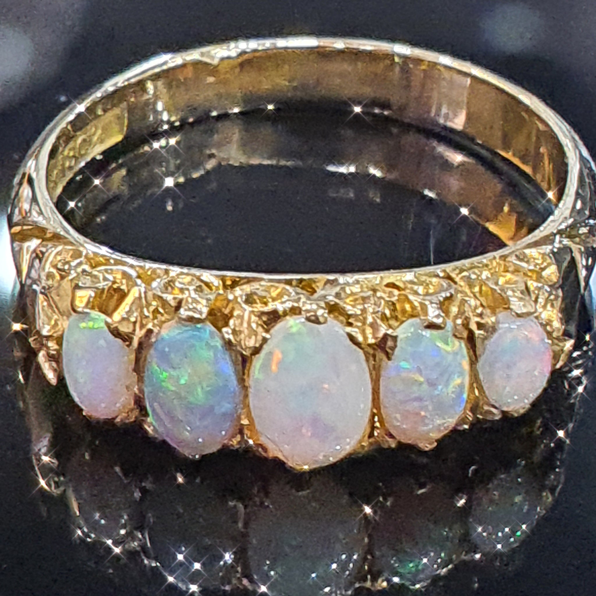 5 Stone Opal Ring set on 18ct Yellow Gold