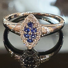 Tanzanite and Diamond ring set on 18ct White Gold